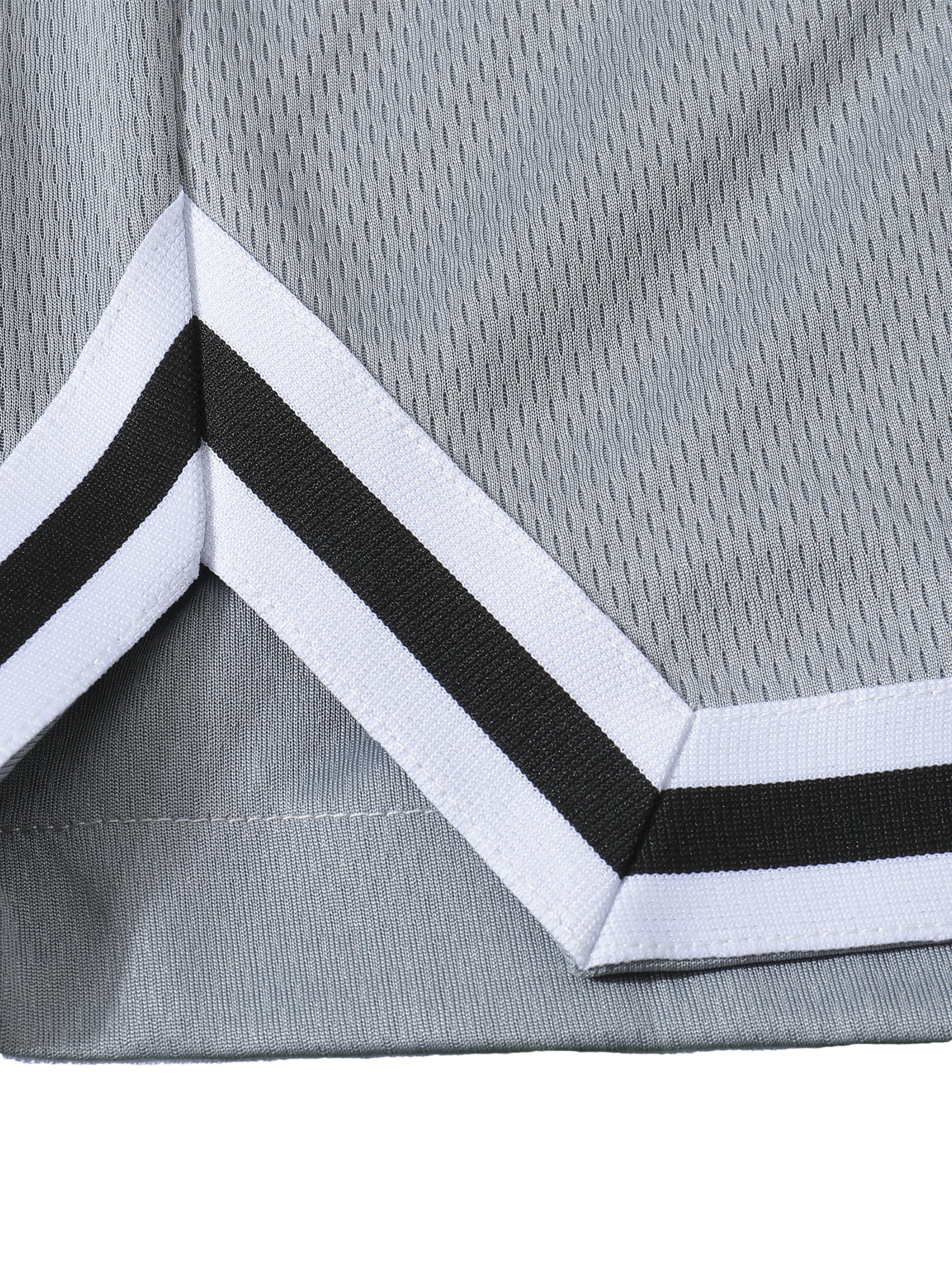 Loki & Ivy Classic Stripe Trim Basketball Shorts showcasing the stylish stripe trim design and breathable fabric.